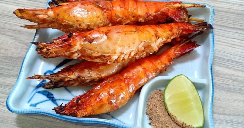 Hình ảnh minh họa một hoặc nhiều câu hỏi thường gặp liên quan đến cách làm và thưởng thức tôm nướng phô mai